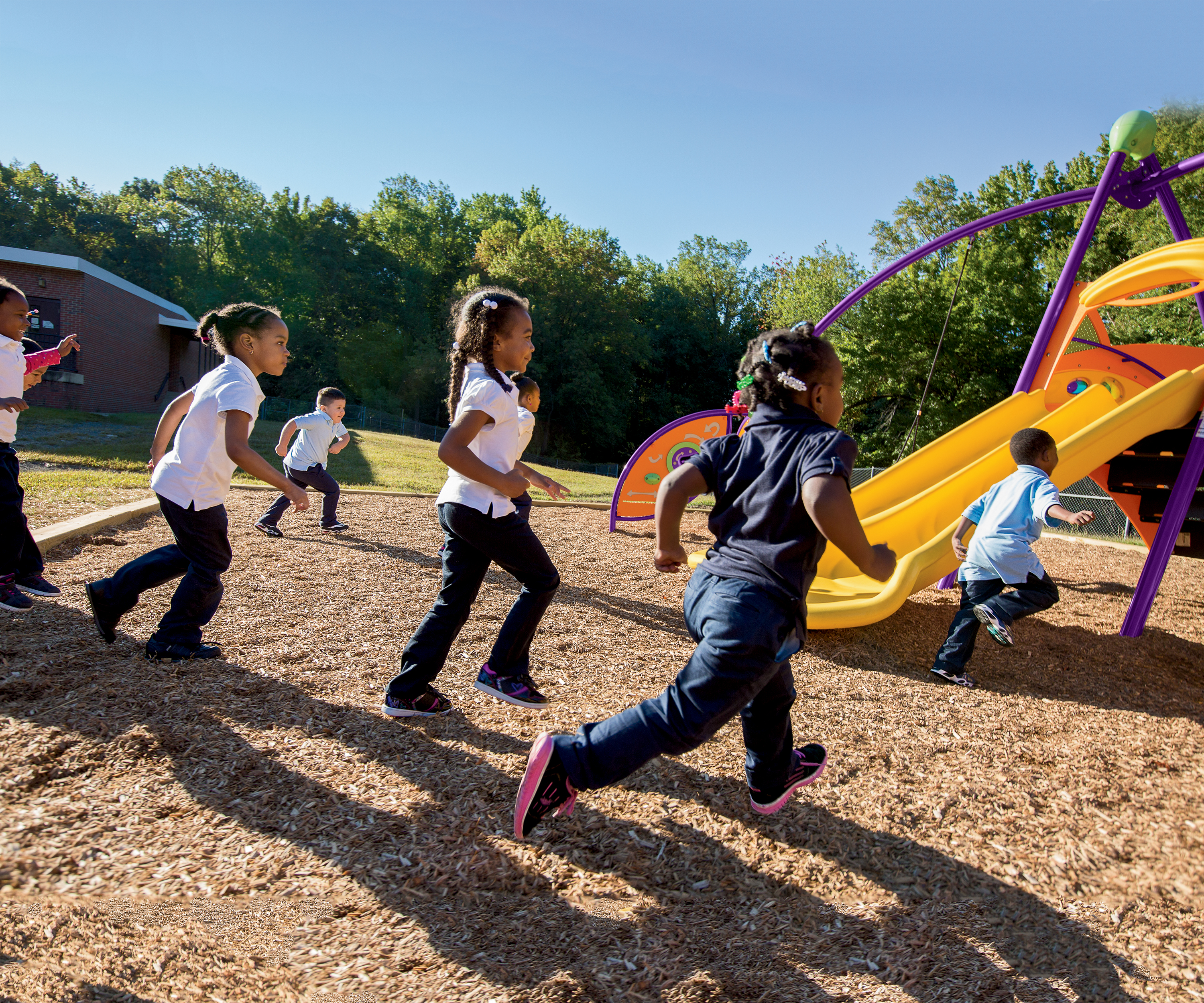 Photo - Kids running towards Activo Bambino playground
