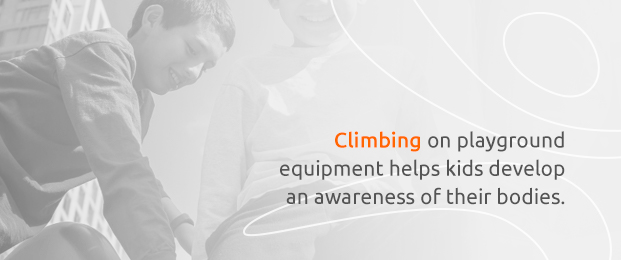 Boy Climbing On The Playground