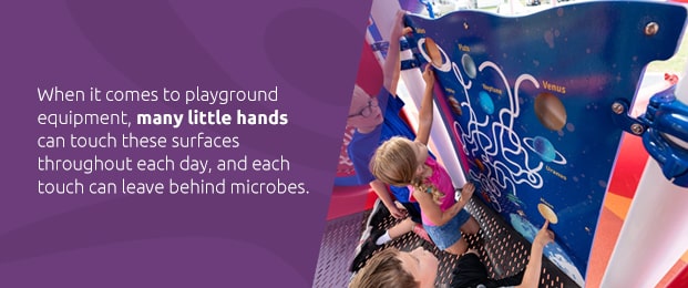 Many little hands touch playground equipment throughout each day and can leave behind microbes