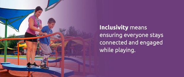 Disabled child on play equipment