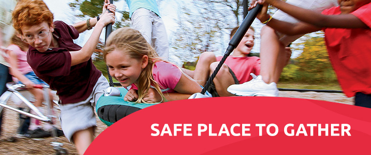 Children swinging together