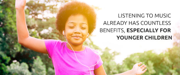 little girl listening to music