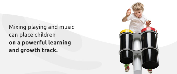 little boy playing with concerto drums