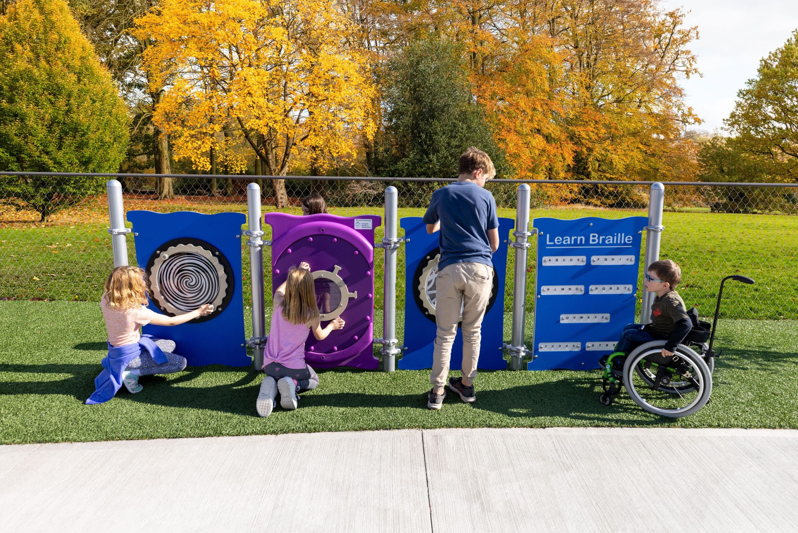 Kids engaging with Play Panels at Julia's Junction