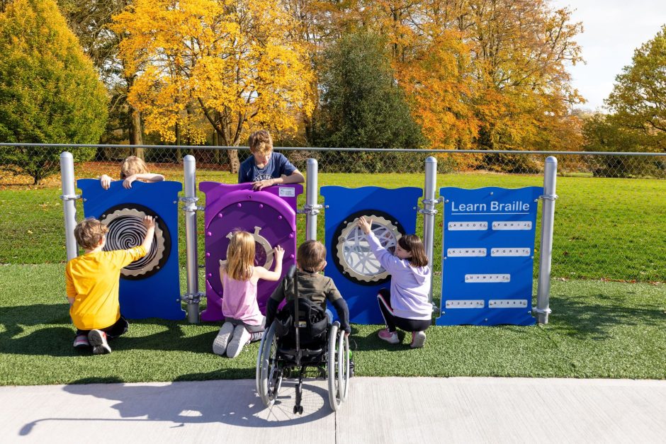 Kids engaging with Play Panels at Julia's Junction