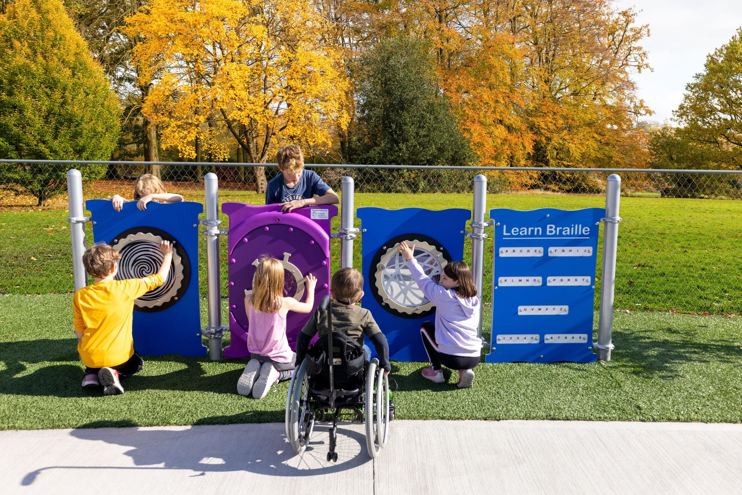 Kids engaging with Play Panels at Julia's Junction