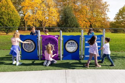 Kids engaging with Play Panels at Julia's Junction