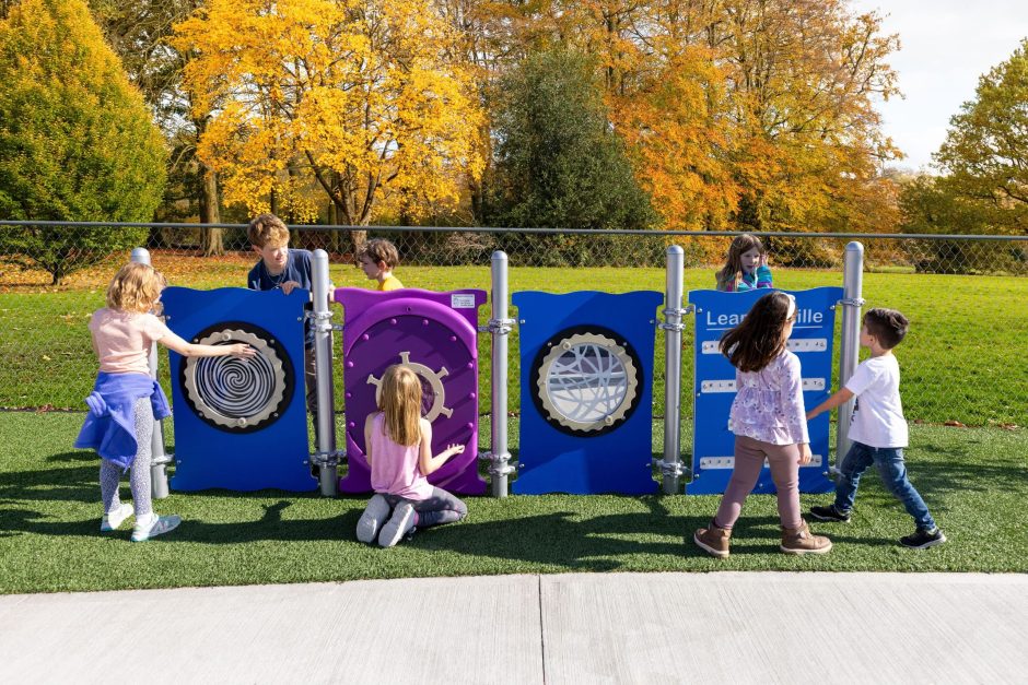 Kids engaging with Play Panels at Julia's Junction