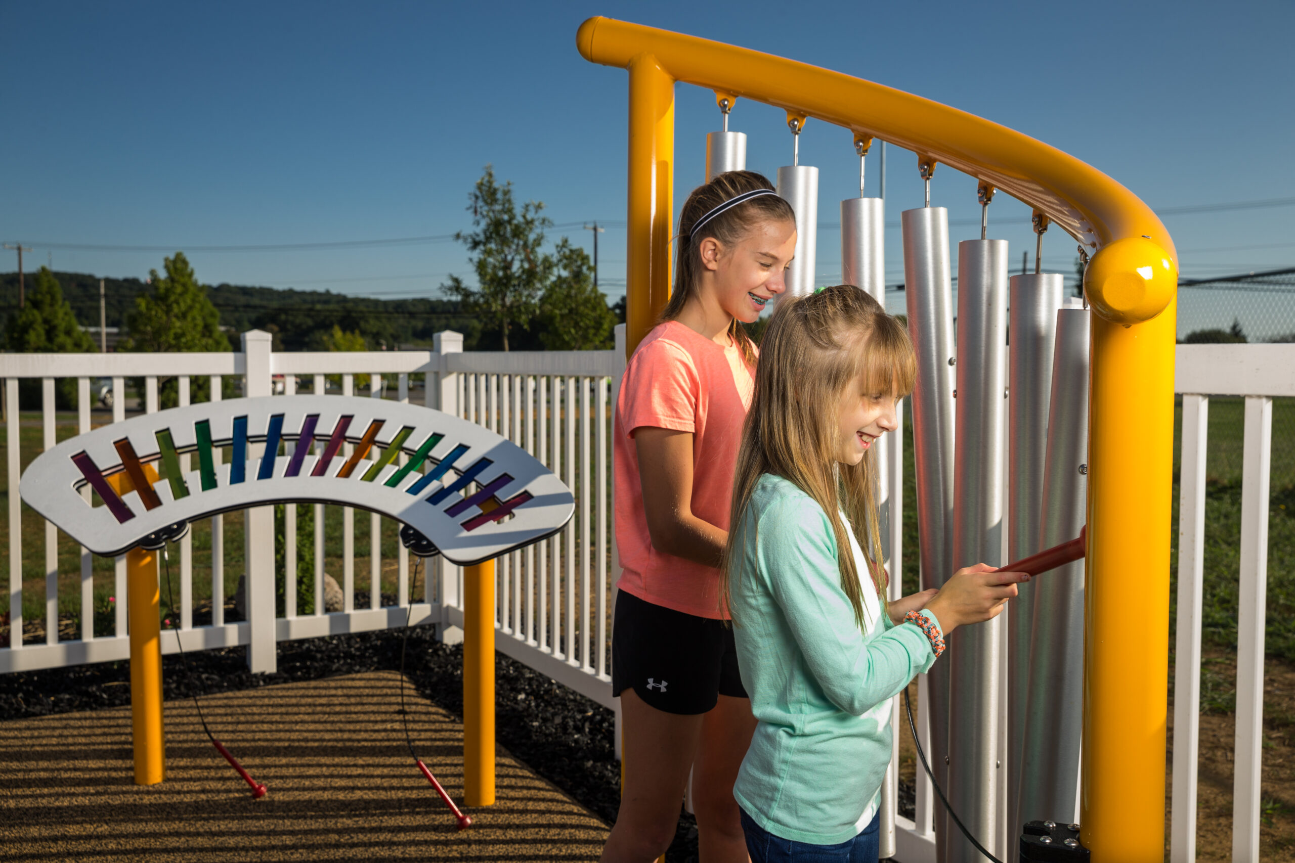 Children making music on the chimes